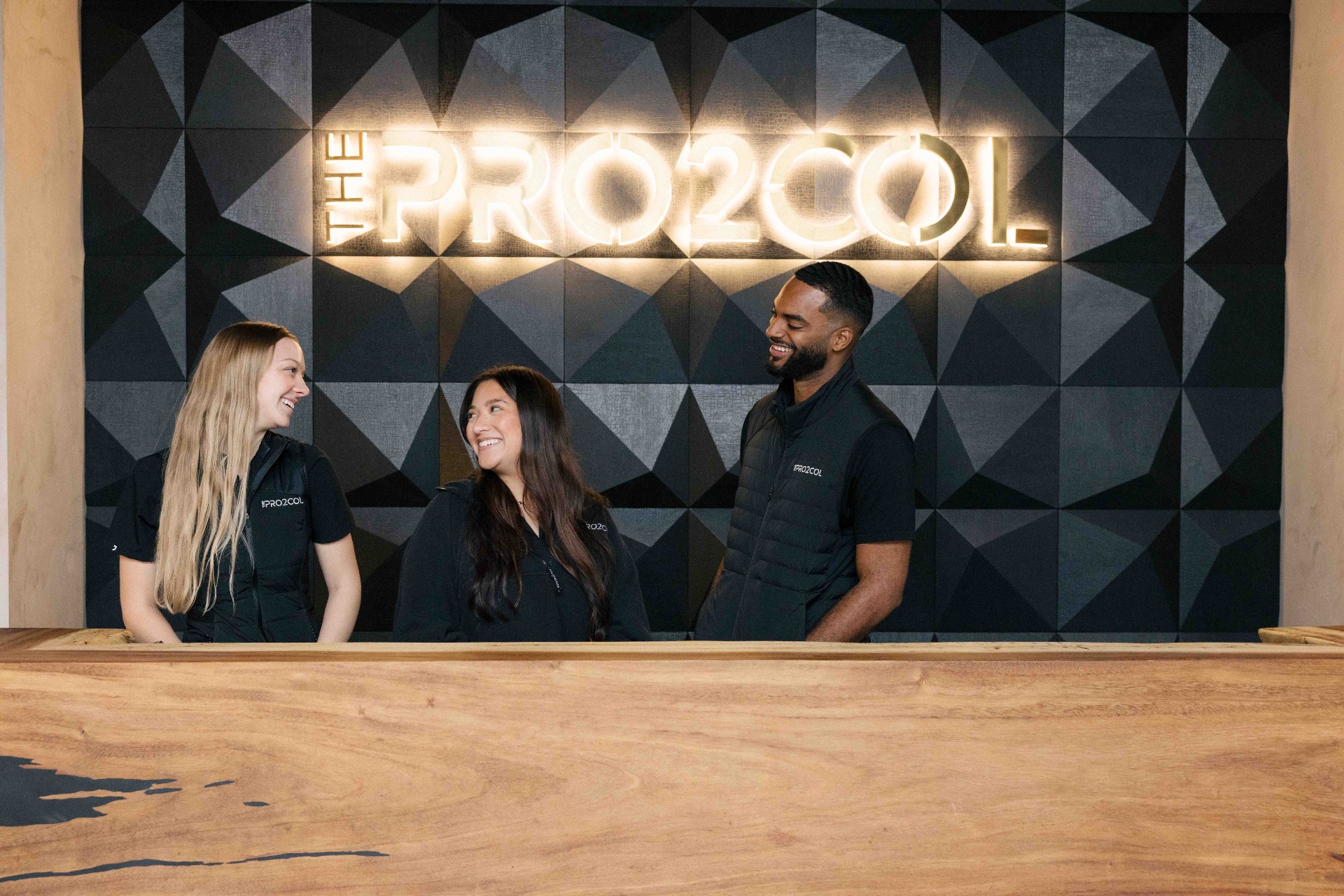 Pro2col team at front desk